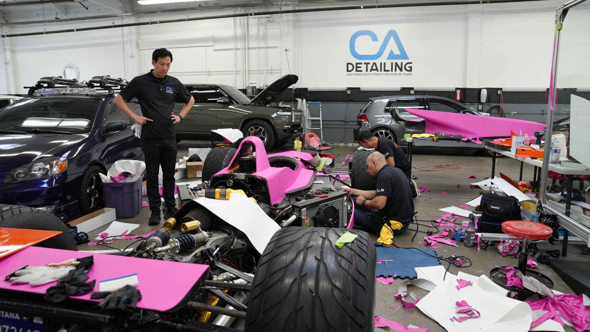 Luxury cars on the San Francisco shop floor