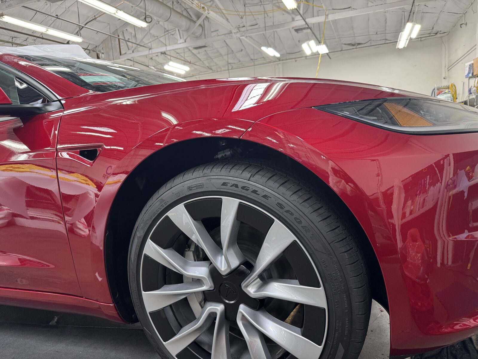 Gloss-black Tesla after ceramic coating