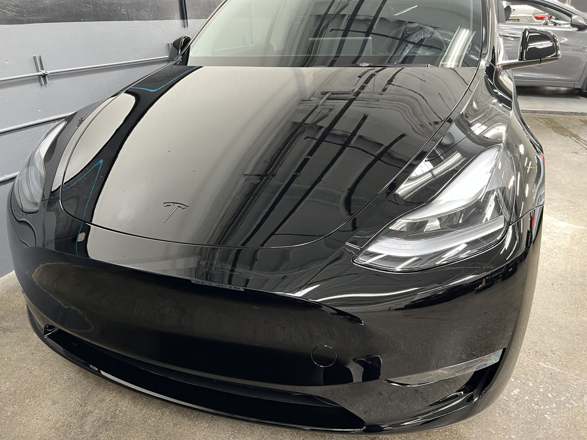 Gloss-black Tesla after ceramic coating